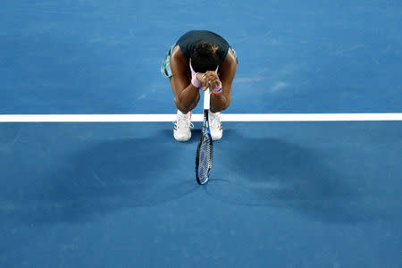 Tennis - Australian Open - Women's Singles Final - Melbourne Park, Melbourne, Australia, January 26, 2019. Japan's Naomi Osaka reacts after winning her match against Czech Republic's Petra Kvitova. REUTERS/Edgar Su