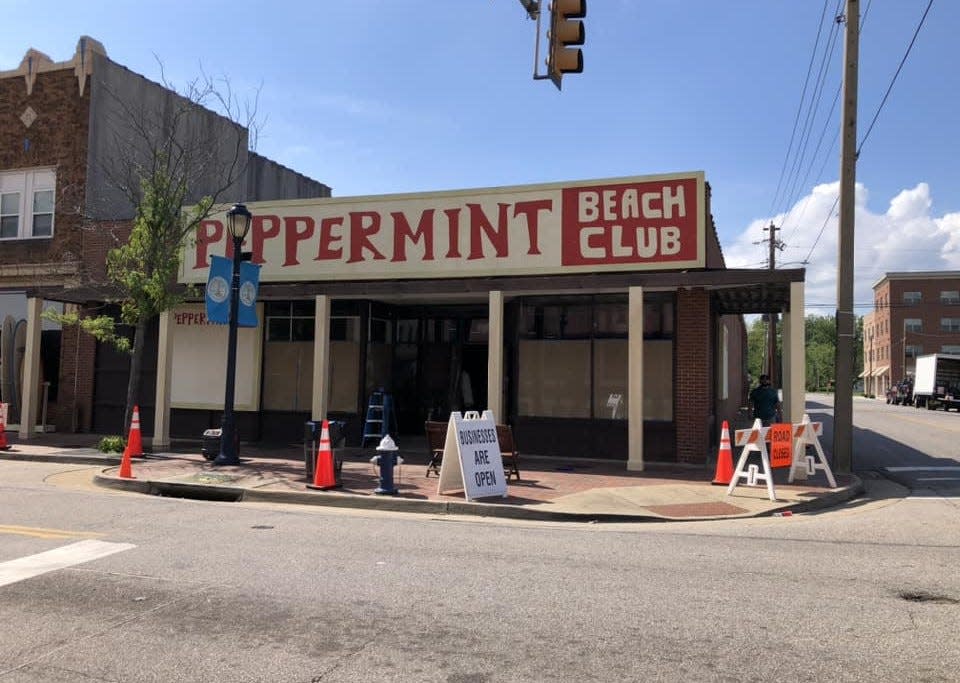 A building at the corner of E. Broadway and Hopewell Street transformed into the Peppermint Beach Club in Hopewell possibly for a Pharrell Williams musical.