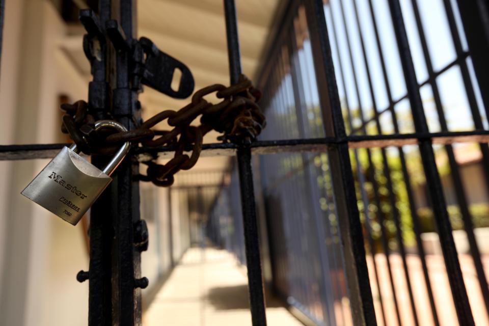 A padlock keeps the campus of Short Avenue Elementary School shuttered on Monday in Mar Vista.