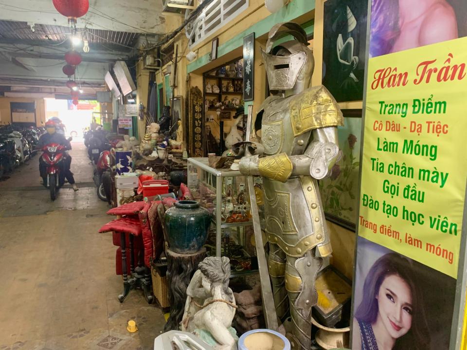 Medieval Knight armor outside a Vietnamese antique shop