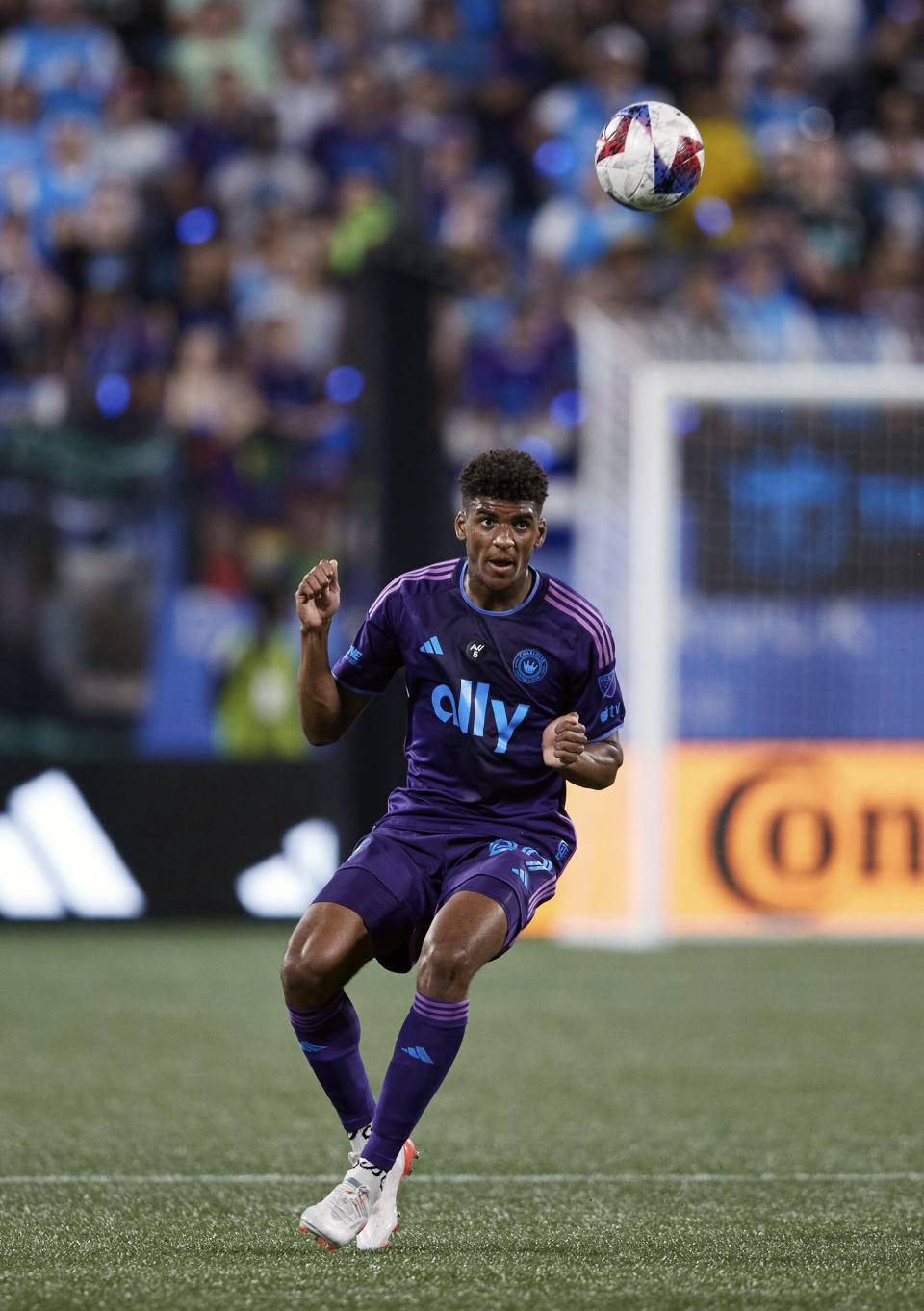 Charlotte FC defender Adilson Malanda (29) heads the ball during an MLS soccer match against the Seattle Sounders, Saturday, June 10, 2023, in Charlotte, N.C. (AP Photo/Brian Westerholt)