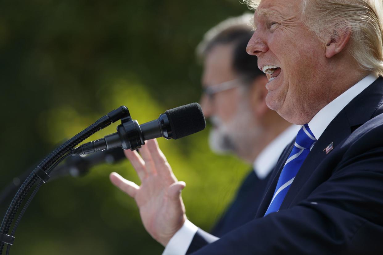 Donald Trump at a press conference outside the White House with Spain Prime Minister Mariano Rajoy: AP