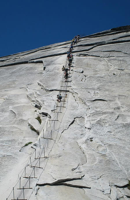 <strong>Half Dome, Cable Route, California</strong> As one of the most iconic peaks in the Yosemite Valley, Half Dome begs to be conquered, but to make it to the top, you have to ascend a cable ladder for more than 400 vertical feet. Only 300 people per day are allowed (via permit) to climb so you will want to make it count.