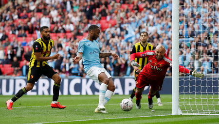 Soccer Football - FA Cup Final - Manchester City v Watford - Wembley Stadium, London, Britain - May 18, 2019 Manchester City's Raheem Sterling scores their sixth goal to complete his hat-trick REUTERS/David Klein