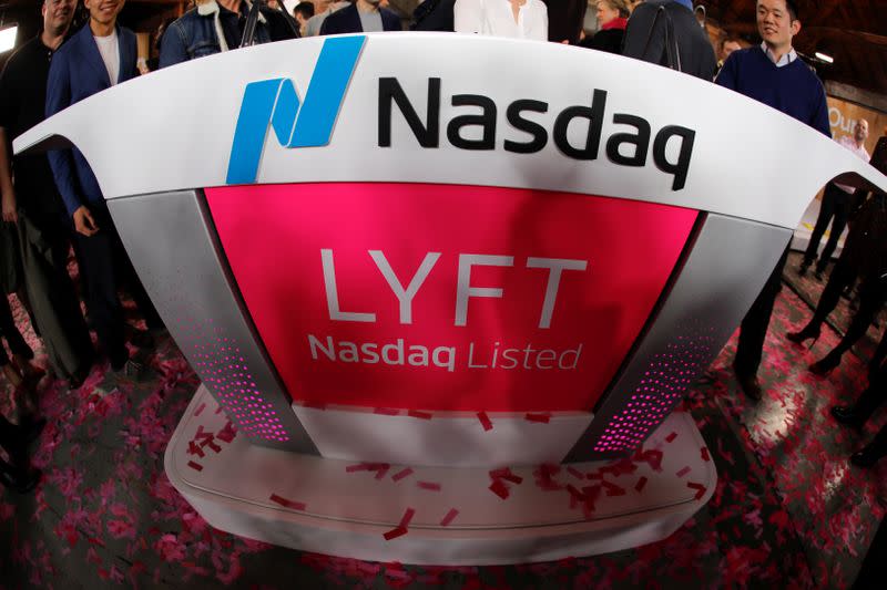 The Lyft logo is shown following the Lyft listing on the Nasdaq at an IPO event in Los Angeles,