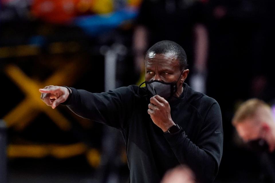 Detroit Pistons head coach Dwane Casey directs from the sideline during the first half of an NBA basketball game against the Chicago Bulls, Sunday, May 9, 2021.