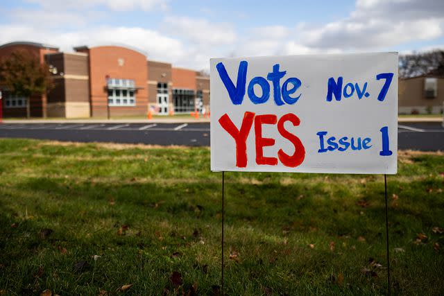 <p>Emily Elconin/Bloomberg via Getty Images</p> A handwritten Issue 1 sign outside a polling location in Toledo, Ohio, US, on Tuesday, Nov. 7, 2023. Ohioans are considering a proposed amendment, called Issue 1, to prevent the state from interfering with reproductive decisions, including contraception, while allowing abortion bans with exceptions after fetal viability.