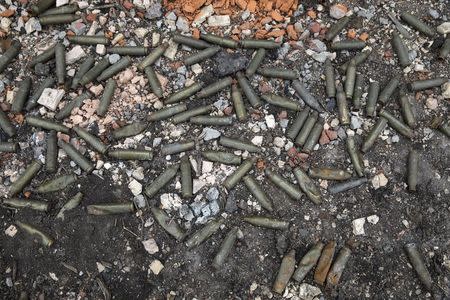 Bullet cartridges are seen on the ground at Donetsk airport, Ukraine, in this February 26, 2015 file photo. REUTERS/Baz Ratner/Files