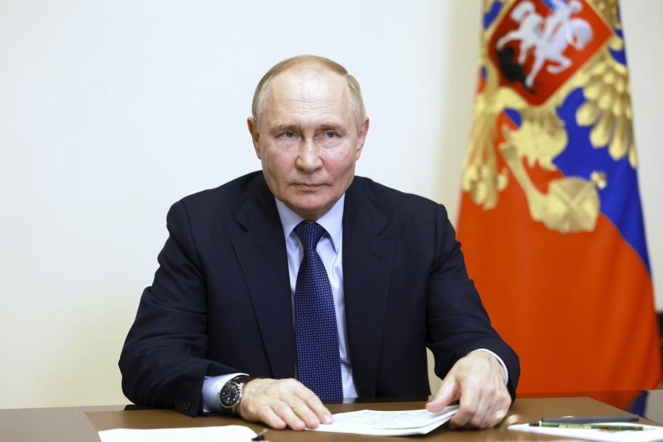 Russian President Vladimir Putin speaks during a meeting with graduates of Russian Presidential Academy of National Economy and Public Administration via videoconference at the Novo-Ogaryovo residence outside Moscow, Russia, Friday, June 28, 2024. (Vyacheslav Prokofyev, Sputnik, Kremlin Pool Photo via AP)