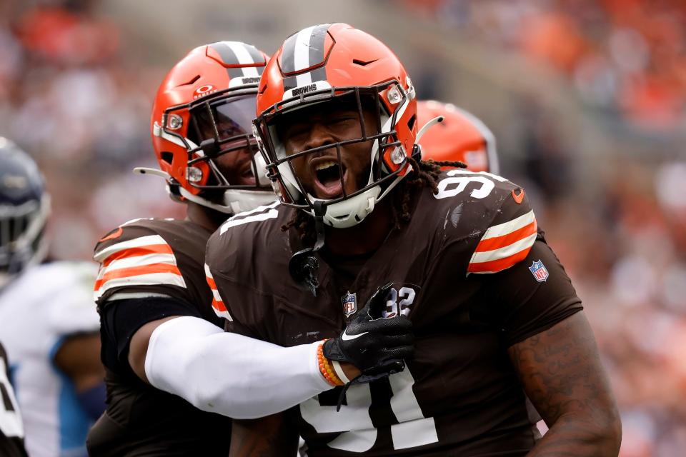 Cleveland Browns defensive end Alex Wright (91) reacts after making a defensive stop during an NFL football game against the Tennessee Titans, Sunday, Sep. 24, 2023, in Cleveland. (AP Photo/Kirk Irwin)