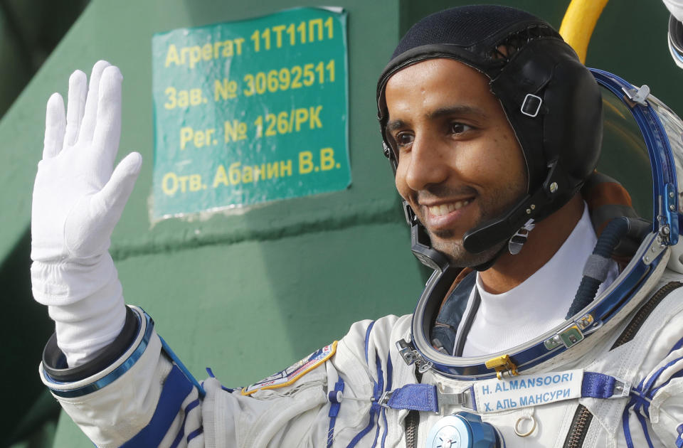 United Arab Emirates astronaut Hazza Al Mansouri, a member of the main crew to the International Space Station (ISS), boards the Soyuz MS-15 spacecraft for the launch at the Russian leased Baikonur cosmodrome, Kazakhstan, Wednesday, Sept. 25, 2019. (Maxim Shipenkov/Pool Photo via AP)