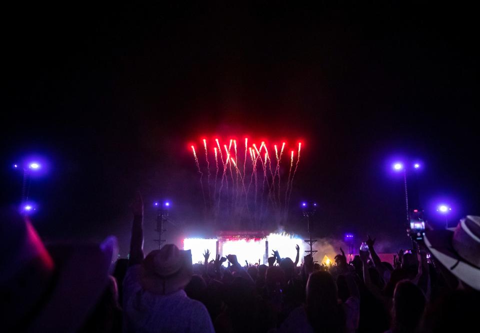 Fireworks light off as Morgan Wallen starts his first song in his headlining set on the Mane Stage during Stagecoach country music festival in Indio, Calif., Sunday, April 28, 2024.