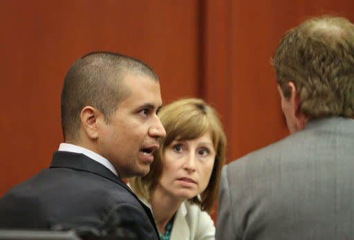 George Zimmerman (L) talks to his attorney Mark O'Mara during his bond hearing in Sanford, Florida, on April 20. Zimmerman, charged with second degree murder over the high-profile shooting of unarmed black teen Trayvon Martin, filed a plea of not guilty on Monday