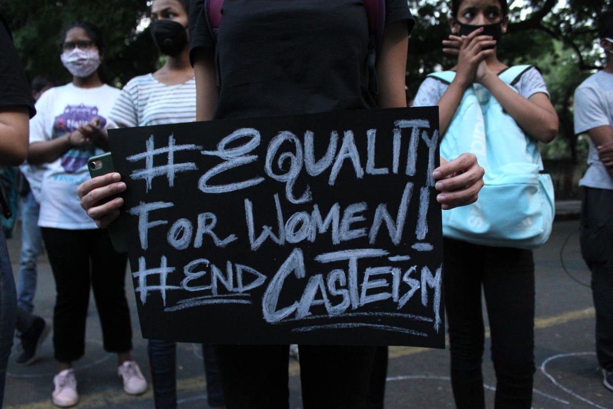 A demonstrator holding placard shouts slogans protesting against Uttar Pradesh government's handling of Hathras and Balrampur Rape case incidents at Jantar Mantar, on October 4, 2020 in New Delhi, India. This has sparked nationwide outrage and days of protests across the country. (Photo by Mayank Makhija/NurPhoto via Getty Images)