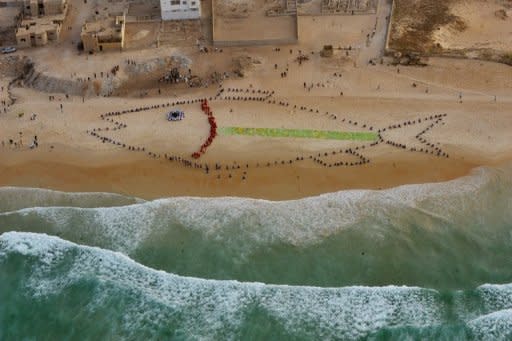 Environmental activists and fishermen in Senegal stage a rally to draw attention to the problems of the country's fisheries sector. A new study warns that warmer seas resulting from current climate change projections will lead to greater acidification and oxygen loss, hitting fisheries and coral reefs