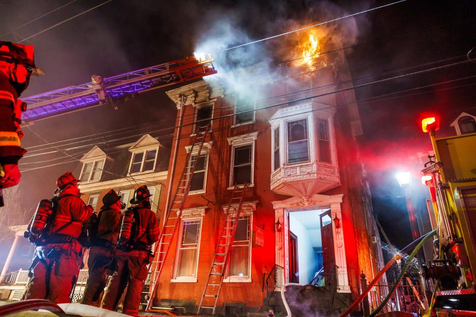 Firefighters battle a deadly fire at a second-alarm apartment building in the first block of West Middle Street early Tuesday, March 12, 2024, in Gettysburg Borough.