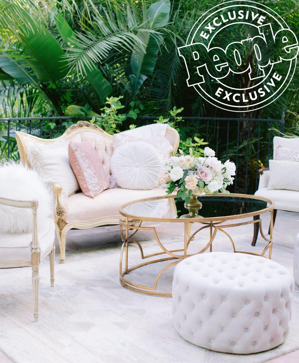 McGrady described her wedding decor as “ethereal,” “romantic” and “wispy.” With the help of <a href="https://sundropvintage.com/" rel="nofollow noopener" target="_blank" data-ylk="slk:Sundrop Vintage;elm:context_link;itc:0;sec:content-canvas" class="link ">Sundrop Vintage</a> which provided the vintage furniture, linens by <a href="https://nuagedesigns.com/" rel="nofollow noopener" target="_blank" data-ylk="slk:Nüage Designs;elm:context_link;itc:0;sec:content-canvas" class="link ">Nüage Designs</a> and stationary by <a href="https://go.skimresources.com/?id=58287X1516331&xs=1&isjs=1&url=https%3A%2F%2Fwww.minted.com%2F&xguid=01DD8Z1VFT2AGZ7FS7N2S89K4M&xuuid=f6776edad604d6730c0a4fdc1dc5781f&xsessid=&xcreo=0&xed=0&sref=https%3A%2F%2Fpeople.com%2Fstyle%2Fmodel-hunter-mcgrady-wedding-dress-inspired-by-meghan-markle%2F&pref=https%3A%2F%2Fwww.google.com%2F&xtz=420&jv=13.19.0-stackpath&bv=2.5.1" rel="noopener" target="_blank" data-ylk="slk:Minted;elm:context_link;itc:0;sec:content-canvas" class="link ">Minted</a>, the bride was able to bring her vision to life. “It's almost like a photoshoot. You're kind of like, ‘Okay! This is a great photo moment. This is a great photo moment,’” she said about the decorations.
