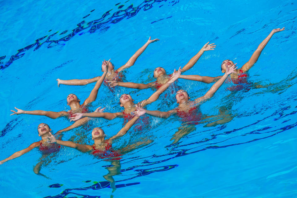 <p>Team Singapore performs during the synchronised swimming team free event on 20 Aug. Singapore won gold in the event, Malaysia took the silver and Indonesia bronze. Photo: Stanley Cheah/SportSG </p>