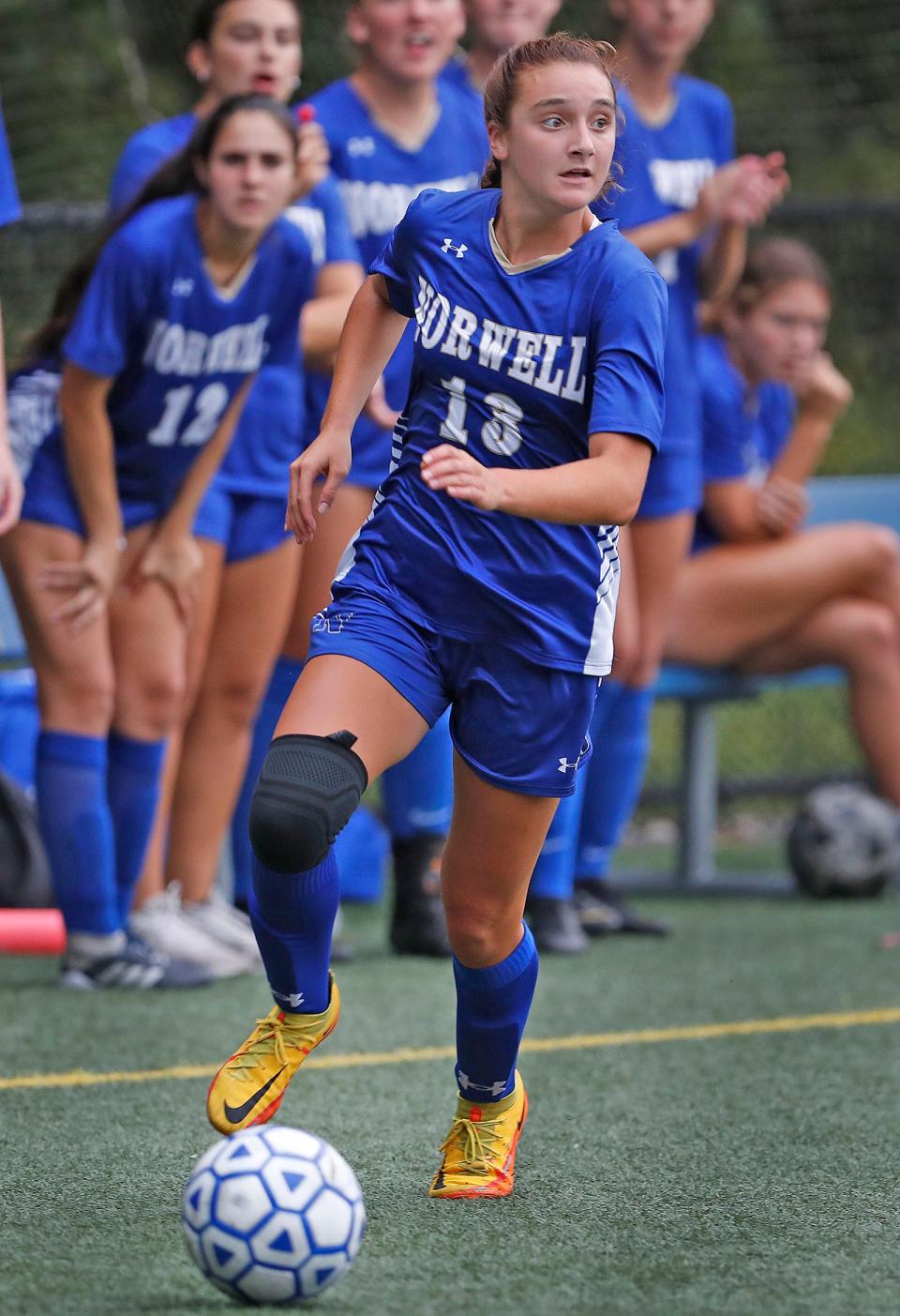 Norwell's Holly Panttila works along the sideline in front of the Norwell bench. The Clippers and Vikings played to a 2-2 tie at Norwell on Monday, Sept. 12, 2022.