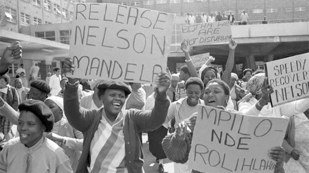 Protesters gather after political prisoner Nelson Mandela fell ill with early signs of tuberculosis and was hospitalised at Tygerberg Hospital in Cape Town. Photo: Getty.
