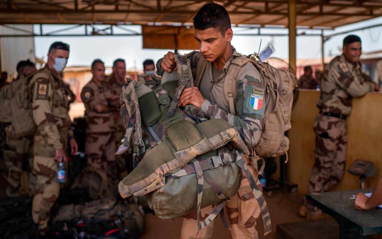 Barkhane force soldiers leave their base in Gao, Mali, in June. - AP