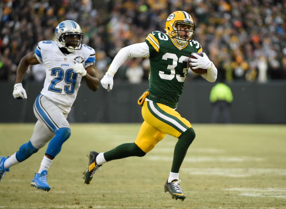 Green Bay Packers returner Micah Hyde takes a punt 55 yards for a touchdown against Detroit.