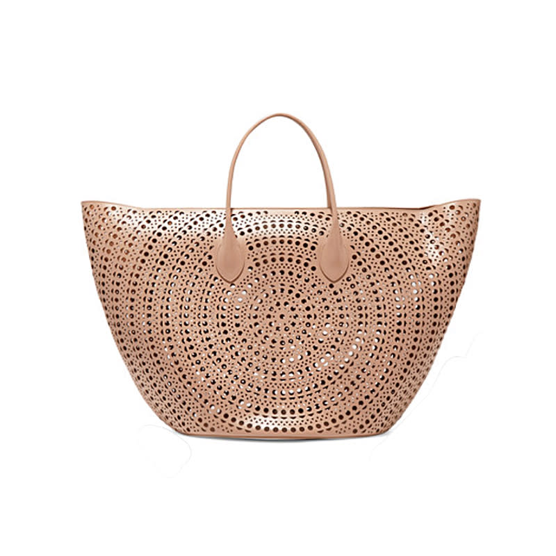 <a rel="nofollow noopener" href="http://rstyle.me/n/cm69qujduw" target="_blank" data-ylk="slk:Large Laser-Cut Leather Tote, Alaïa, $4830;elm:context_link;itc:0;sec:content-canvas" class="link ">Large Laser-Cut Leather Tote, Alaïa, $4830</a>