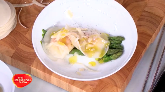 Egg Yolk Ravioli with green asparagus and shaved parmesan