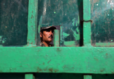 A member of Central Reserve Police Force stands guard at a vote counting centre in New Delhi, India, May 22, 2019. REUTERS/Anushree Fadnavis