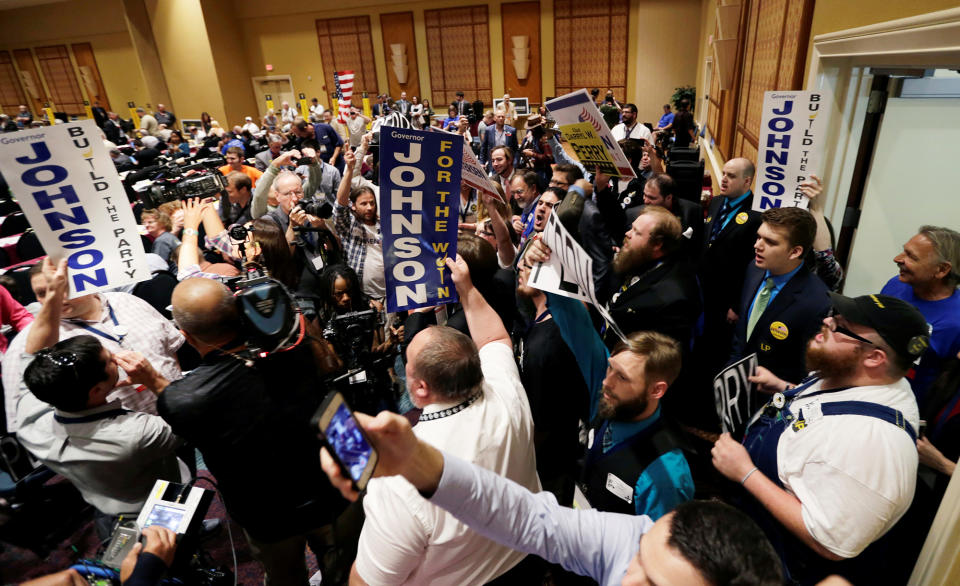 Attendees at the Libertarian Party National Convention yell for their candidates at the Rosen Center in Orlando, Fla., on May 29. (Photo: Kevin Kolczynski/Reuters)