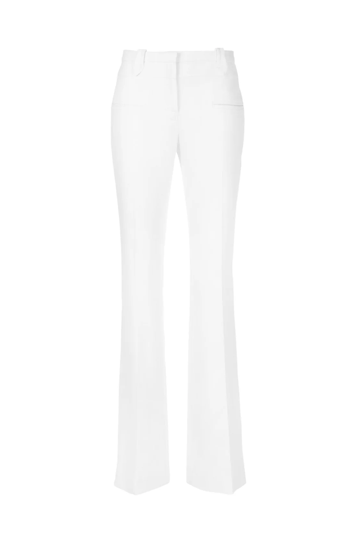 a pair of white altuzarra pants on a plain backdrop