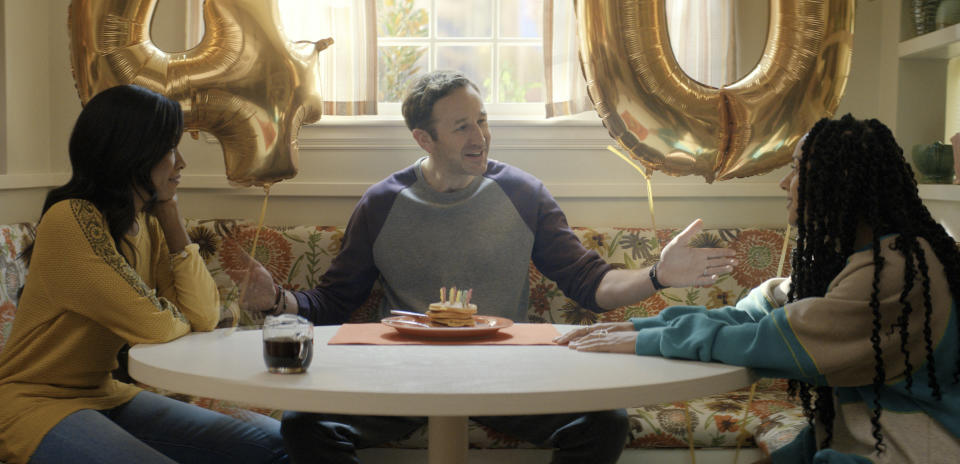 This image released by Apple TV+ shows Gabrielle Dennis, from left, Chris O’Dowd and Djouliet Amara in a scene from "The Big Door Prize." (Apple TV+ via AP)