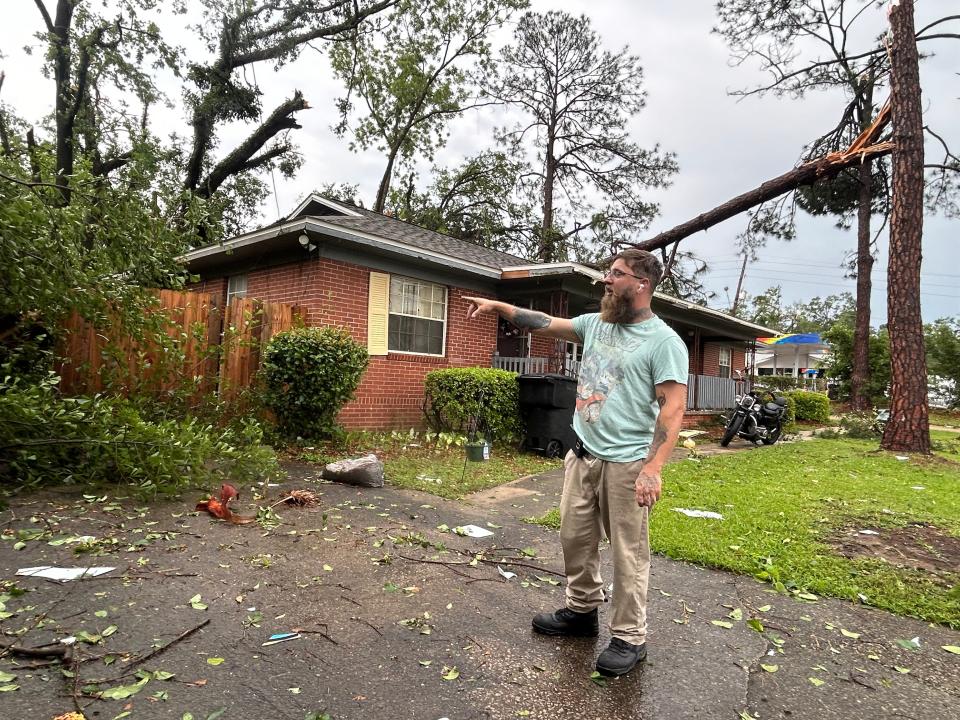 Codi Morris points out the damages around his Tallahassee duplex following the storm on Friday, May 10, 2024