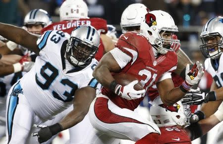 FILE PHOTO: Jan 24, 2016; Charlotte, NC, USA; Arizona Cardinals running back David Johnson (31) runs the ball as Carolina Panthers defensive tackle Kyle Love (93) defends during the second quarter in the NFC Championship football game at Bank of America Stadium. Jason Getz-USA TODAY Sports / Reuters Picture Supplied by Action Images