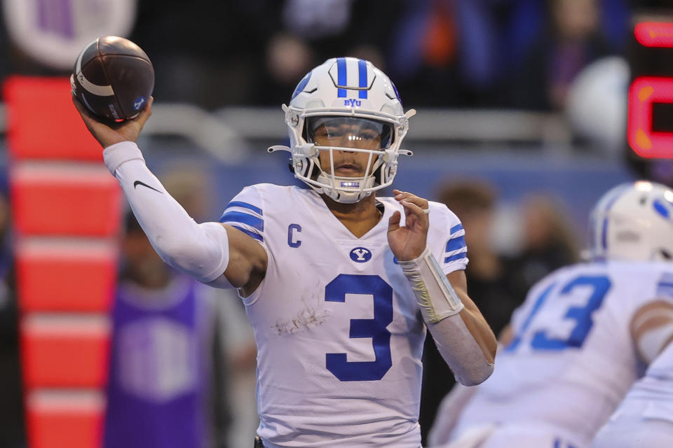 BYU quarterback Jaren Hall (3) looks to throw against Boise State in the first half of an NCAA college football game, Saturday, Nov. 5, 2022, in Boise, Idaho. (AP Photo/Steve Conner)