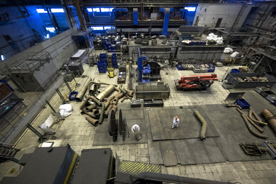 In this photo taken on Tuesday, July 16, 2019, workers work continues to dismantle a Turbine Hall of Ignalina Nuclear Power Plant (NPP) in Visaginas some 160km.(100 miles) northeast of the capital Vilnius, Lithuania. The HBO TV series “Chernobyl” featuring Soviet era nuclear nightmares is drawing tourists to the atomic filming locations and helping Lithuania grow as a tourist destination. (AP Photo/Mindaugas Kulbis)