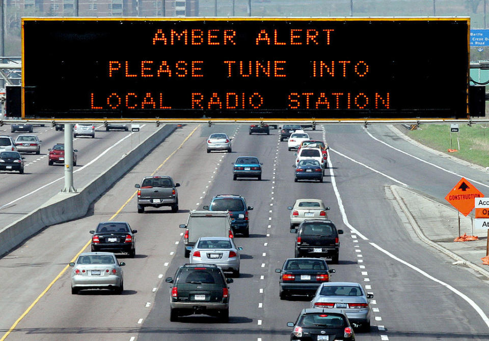 An Amber Alert is displayed on sign over westbound Highway 401 near Keele St. in 2014. (File photo from Jim Wilkes/Toronto Star/Getty Images)