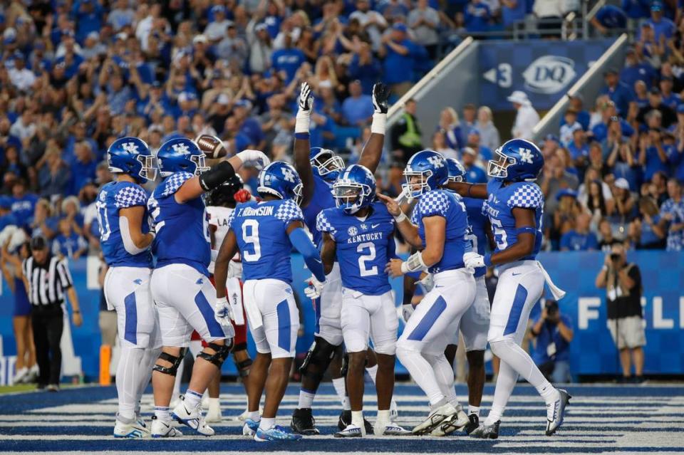 Kentucky wide receiver Barion Brown (2) celebrates scoring one of his two touchdowns against Northern Illinois on Saturday at Kroger Field.