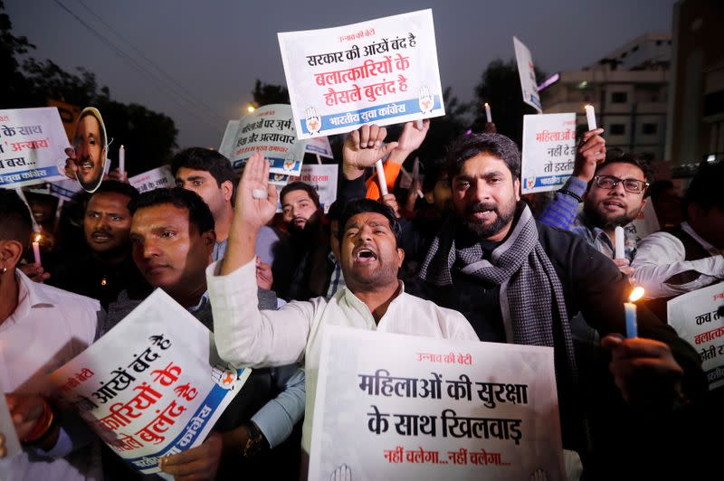 Members of the youth wing of India's main opposition Congress party shout slogans during a protest against Uttar Pradesh state government, in New Delhi