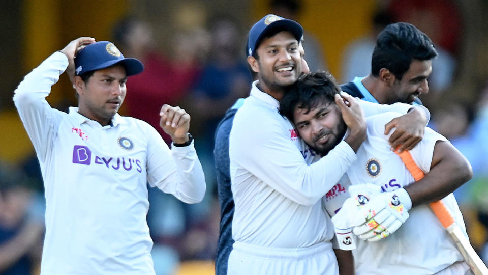 Rishabh Pant is seen here being hugged by an Indian teammate at the Gabba.