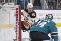 Anaheim Ducks left wing Max Comtois (44) scores a goal over San Jose Sharks goaltender Kaapo Kahkonen (34) during the second period in an NHL hockey game Tuesday, April 26, 2022, in San Jose, Calif. (AP Photo/Tony Avelar)