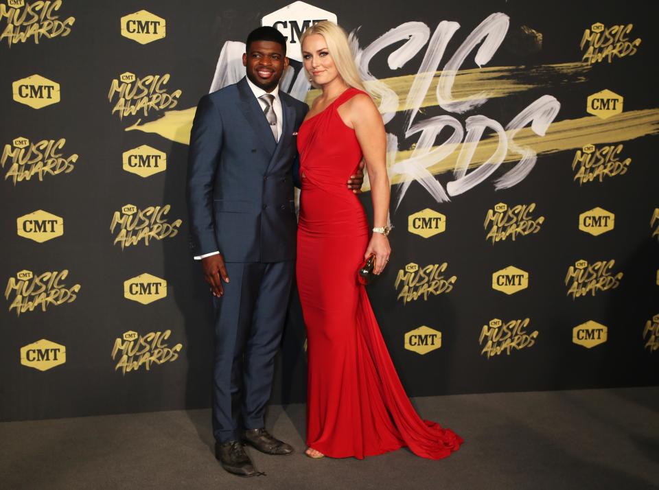 P.K. Subban and Lindsey Vonn made their debut as a couple on the red carpet of the 2018 CMT Music Awards. (REUTERS/Jamie Gilliam)