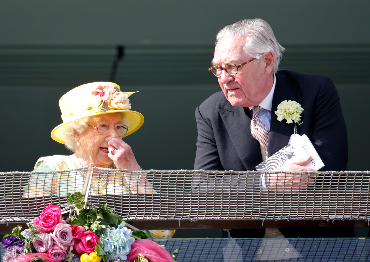 EPSOM, UNITED KINGDOM - JUNE 03: (EMBARGOED FOR PUBLICATION IN UK NEWSPAPERS UNTIL 48 HOURS AFTER CREATE DATE AND TIME) Queen Elizabeth II and Lord Samuel Vestey watch the racing as they attend Derby Day during the Investec Derby Festival at Epsom Racecourse on June 3, 2017 in Epsom, England. (Photo by Max Mumby/Indigo/Getty Images)