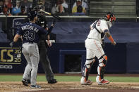 Houston Astros catcher Martin Maldonado reacts after Tampa Bay Rays' Michael Brosseau struck out with bases loaded during the sixth inning in Game 4 of a baseball American League Championship Series, Wednesday, Oct. 14, 2020, in San Diego. (AP Photo/Jae C. Hong)
