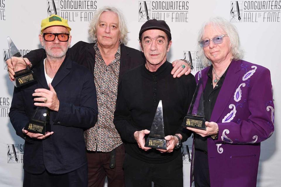 <p>L. Busacca/Getty</p> Michael Stipe, Peter Buck, Bill Berry and Mike Mills of R.E.M. at the Songwriters Hall of Fame Induction and Awards Gala in New York City on June 12, 2024