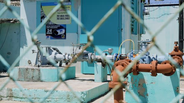 PHOTO: The community groundwater pump in Salinas, Puerto Rico, sits inoperable behind a fence. (David Miller/ABC News)