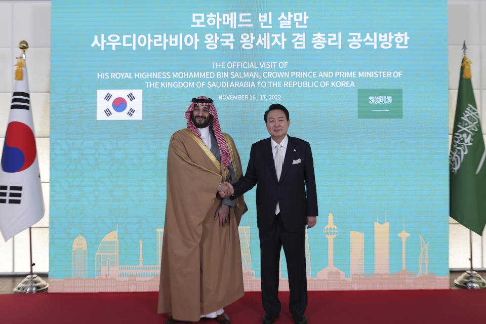 Saudi Arabian Crown Prince Mohammed bin Salman, left, shakes hands with South Korean President Yoon Suk Yeol before a meeting at the presidential residence in Seoul, South Korea, Thursday, Nov. 17, 2022.(South Korean Presidential Office/Yonhap via AP)