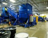 E-waste recycling machinery at an Apple recycling facility in Austin