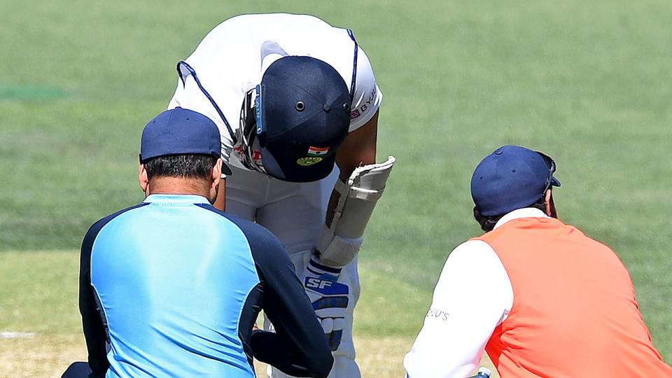 Seen here, Mohammed Shami receives treatment after being hit on the arm in Adelaide.