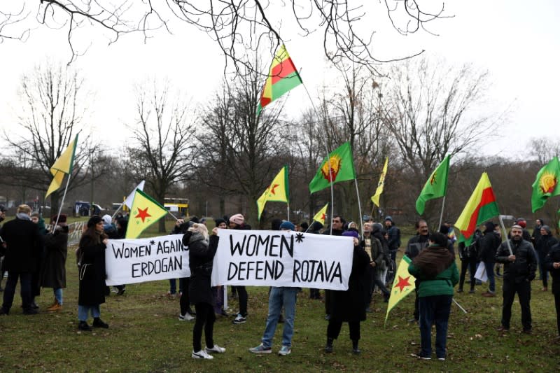 Protesters take part in a demonstration against Turkish President Tayyip Erdogan participating in the Libya summit in Berlin